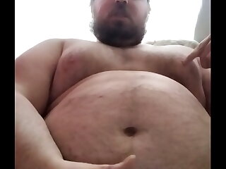 Witness the ultimate fat acceptance as Scottishfatty, a chubby gainer, reaches climax. His moobs jiggle, belly bulges, and his dick oozes hot cum. This is a celebration of self-love and unapologetic embracement of one's body.