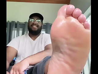 Soloboy craves the divine touch of his master's massive feet. Worshipping each toe, he licks and kisses the soles, lost in ecstasy. This bear daddy knows the ultimate pleasure.